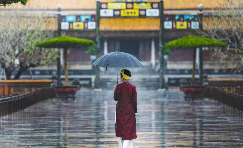 Rainy season in Hue with ancient landmarks and lush greenery.