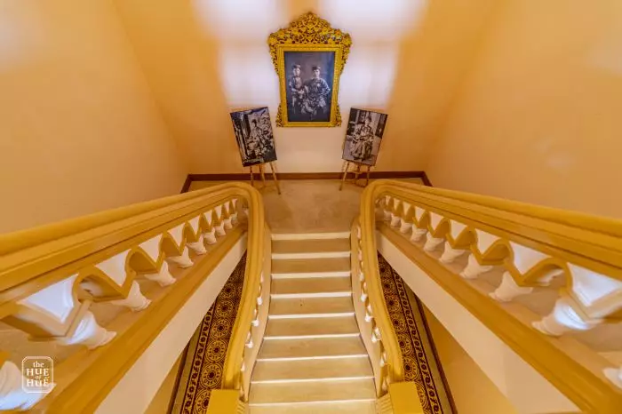 View of the elegant staircase inside Kien Trung Palace, featuring detailed design elements.