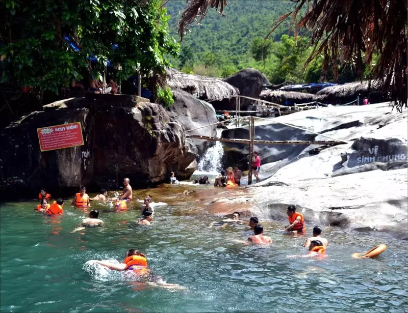 Elephant Springs in Hue with elephant-shaped rocks, clear water, and lush green surroundings – a top eco-tourism destination in Vietnam.