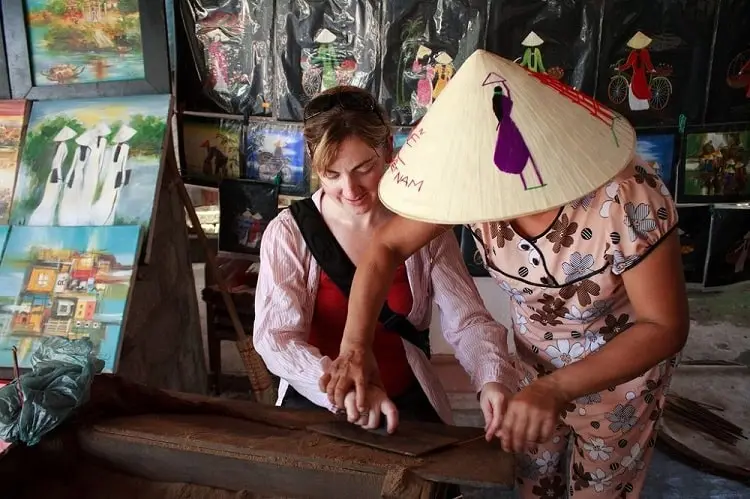 Handmade incense-making process in Thuy Xuan Incense Village, Hue, Vietnam.