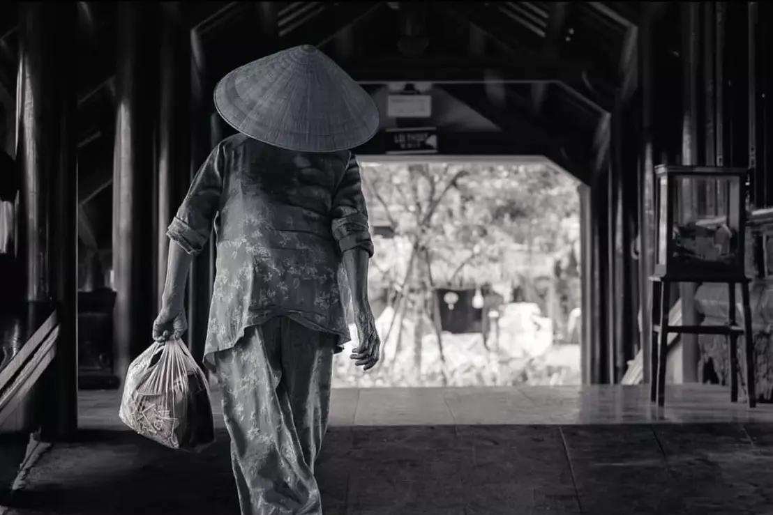 Thanh Toan Tile-Roofed Bridge in Hue, built in 1776 by Mrs. Tran Thi Dao, a symbol of generosity and community spirit.