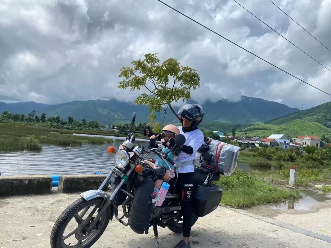 Motorbike ride along the route from Hue to Quang Binh with picturesque landscapes and local attractions.