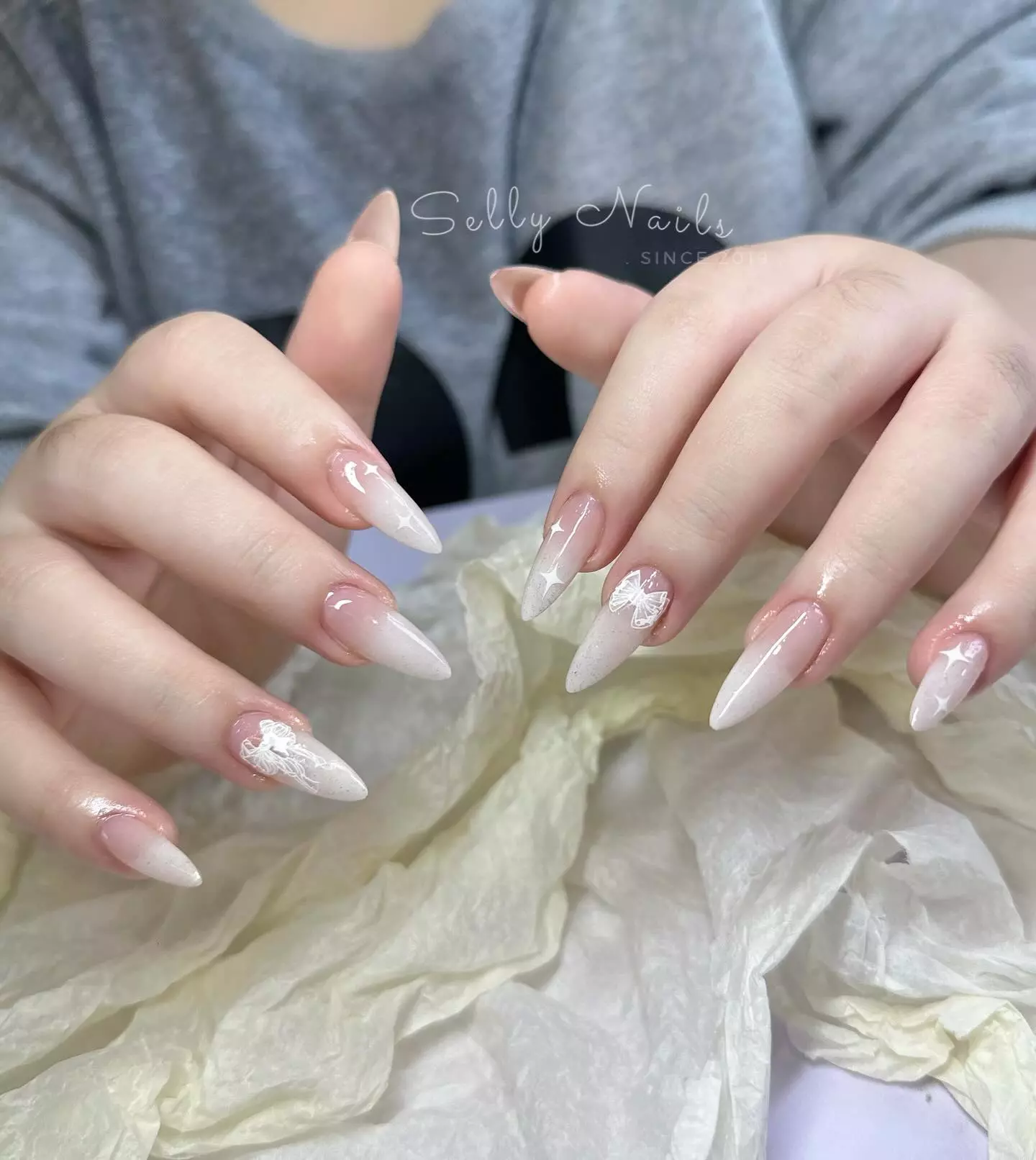 Interior view of Selly Nails in Hue City, showcasing trendy and high-quality nail art services in a spacious, clean environment.