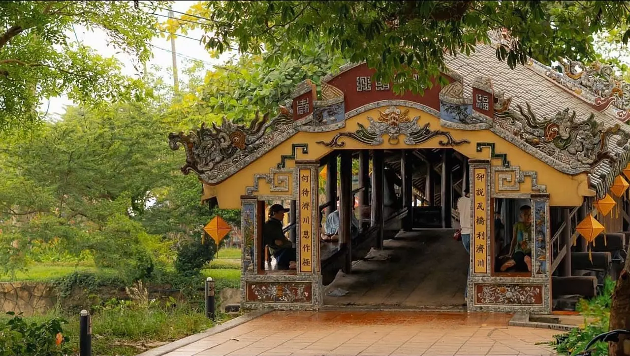 Thanh Toan Bridge in Hue, showcasing its rustic charm and scenic surroundings, ideal for cultural exploration and photography.